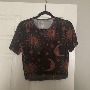 sheer black top w/ sun moon and stars